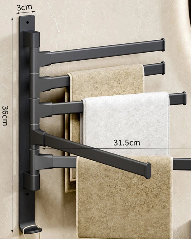 Black towel rack with towels on a beige wall, showing dimensions.